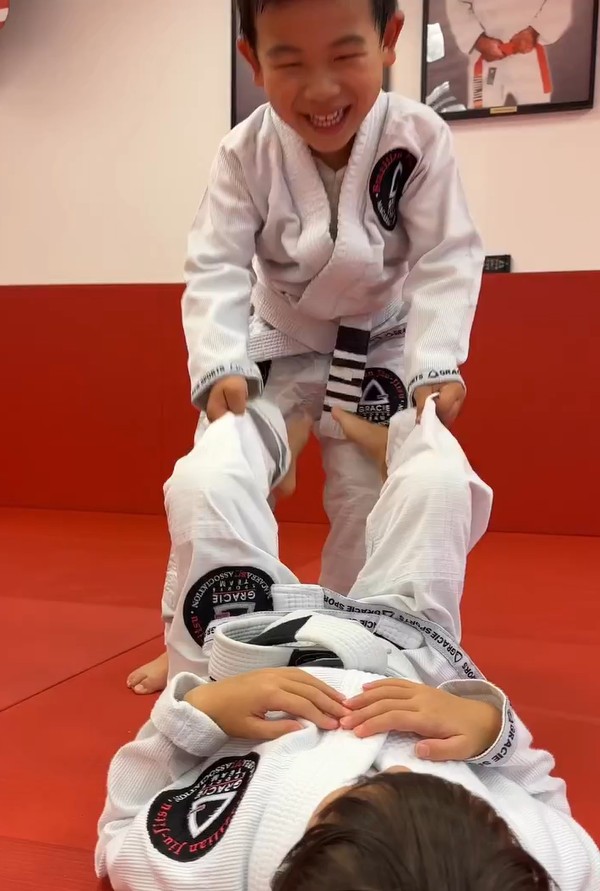 Kids drilling techniques at Gracie Sports